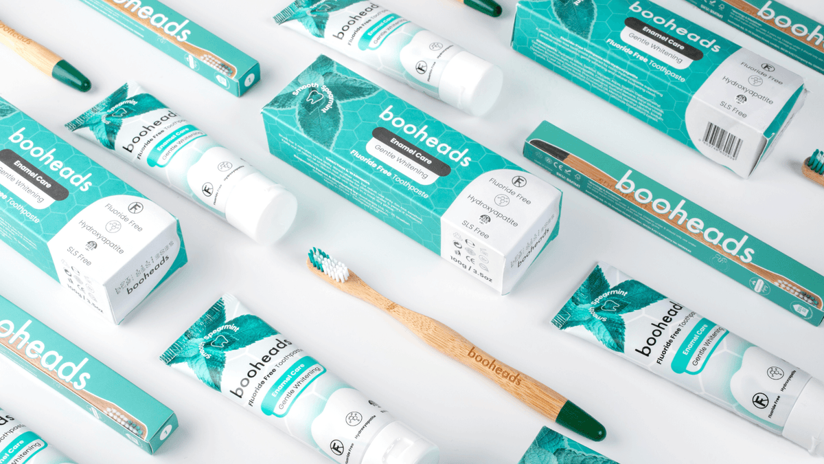 booheads dental care products including toothbrushes and toothpaste on a white background