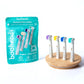booheads toothbrush heads with packaging and wooden stand on a white background