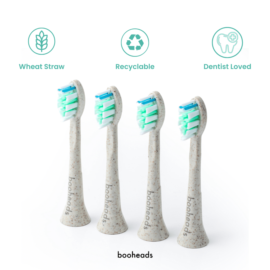 Four booheads toothbrush heads on a white background with icons and text indicating sustainability.