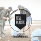 Two people participating in a beach cleanup with 'Proudly Supporting Less Plastic' text and 'booheads' branding.