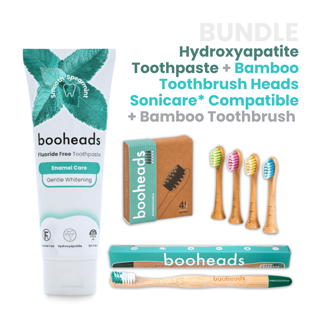 booheads toothpaste and bamboo toothbrush set with packaging on a white background