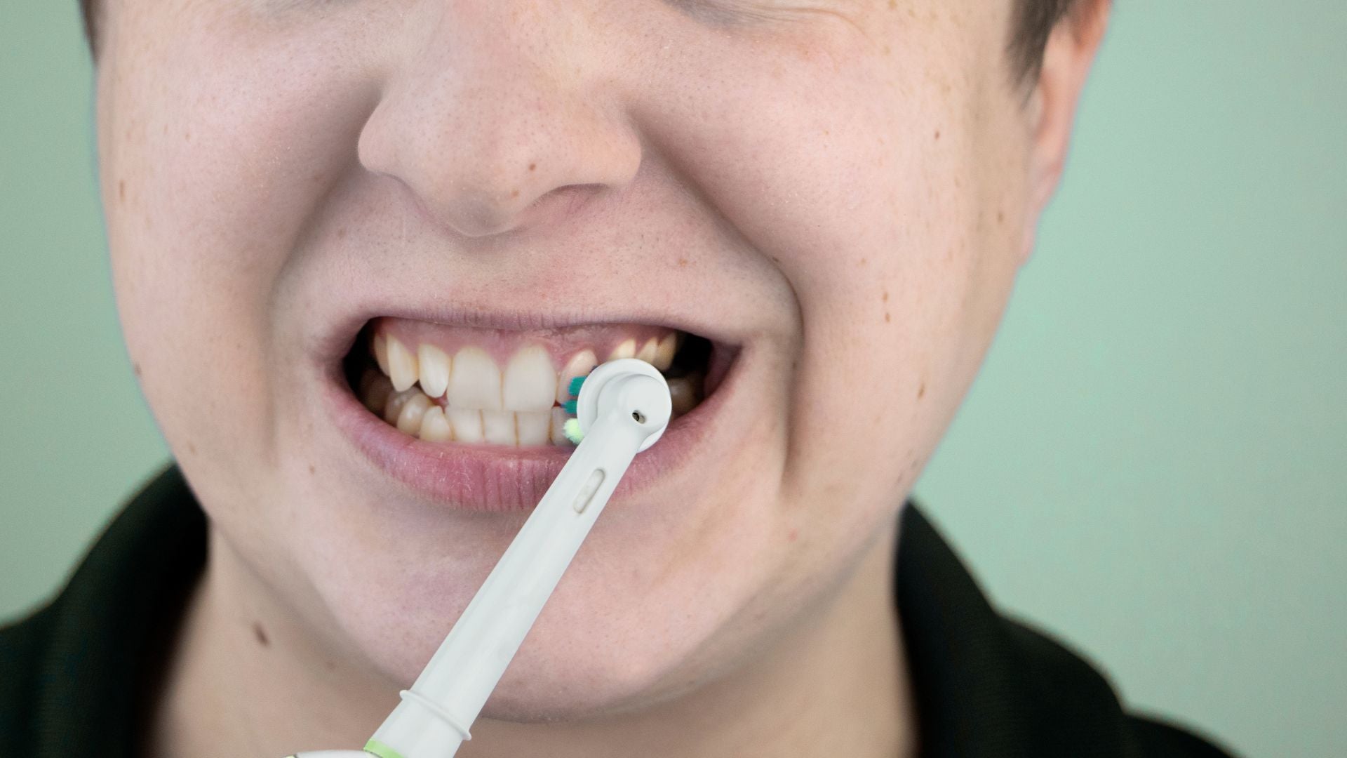 booheads electric toothbrush head compatible with Oral-B in use