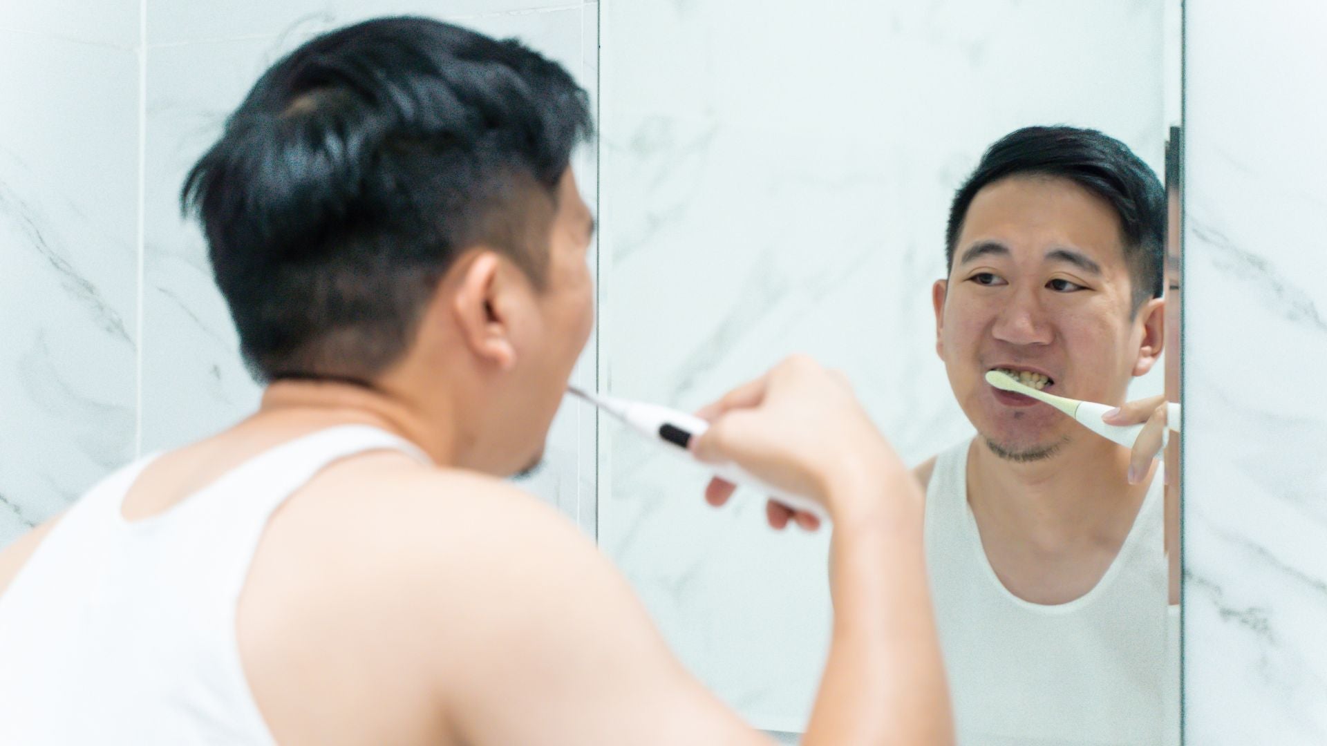 booheads sonic electric toothbrush head compatible with Sonicare in use