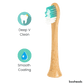 Wooden toothbrush with teal bristles on a black background