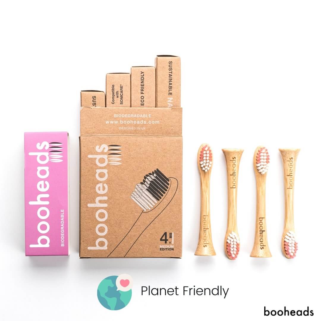 booheads toothbrushes with packaging and toothbrushes displayed on a white background